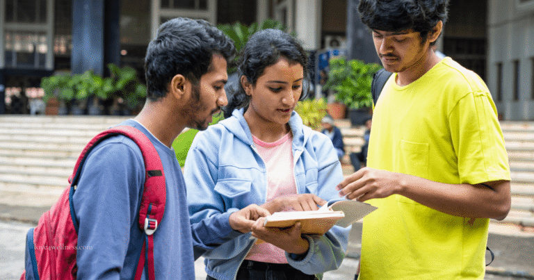 Indian teenagers comparing notes on exam subjects, the students a coaching institute success rate rarely reflects